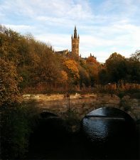 University of Glasgow spire behind autumnal trees