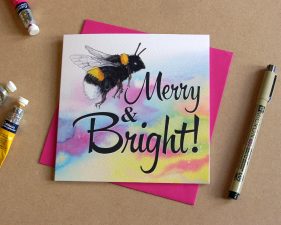 Product shot of bee merry and bright card