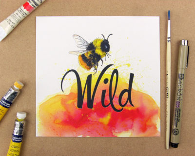 Print showing a bumblebee above the word wild on red watercolour background. Forming the phrase Be wild.