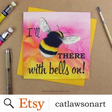 Greetings card with the words 'I'll be there with bells on' with the word 'be' replaced with an illustrated bumblebee on pink watercolour background