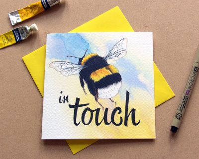 Product shot of bee in touch card