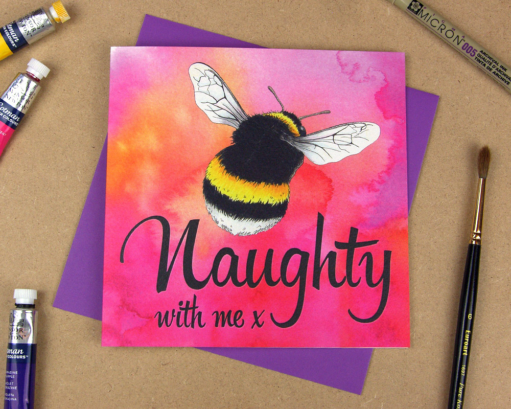 Greetings card with the words 'Be naughty with me' with the word 'be' replaced with an illustrated bumblebee on pink watercolour background